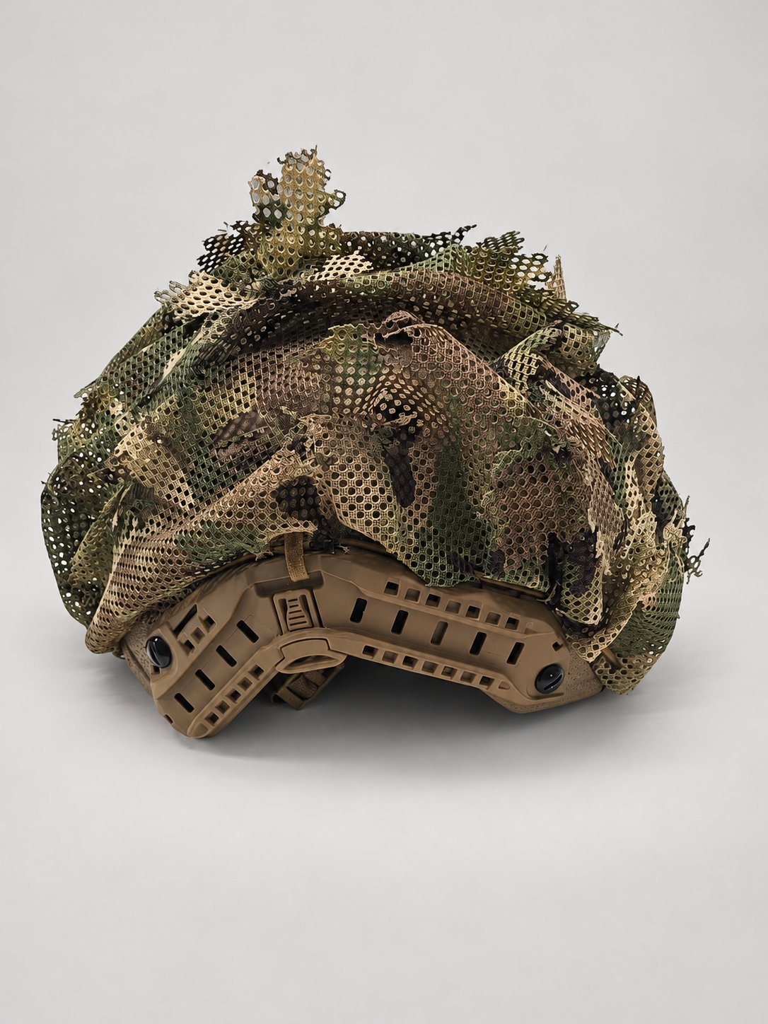Alternate view 3 of the Tatou Armor MultiCam mesh helmet cover on a tan tactical helmet