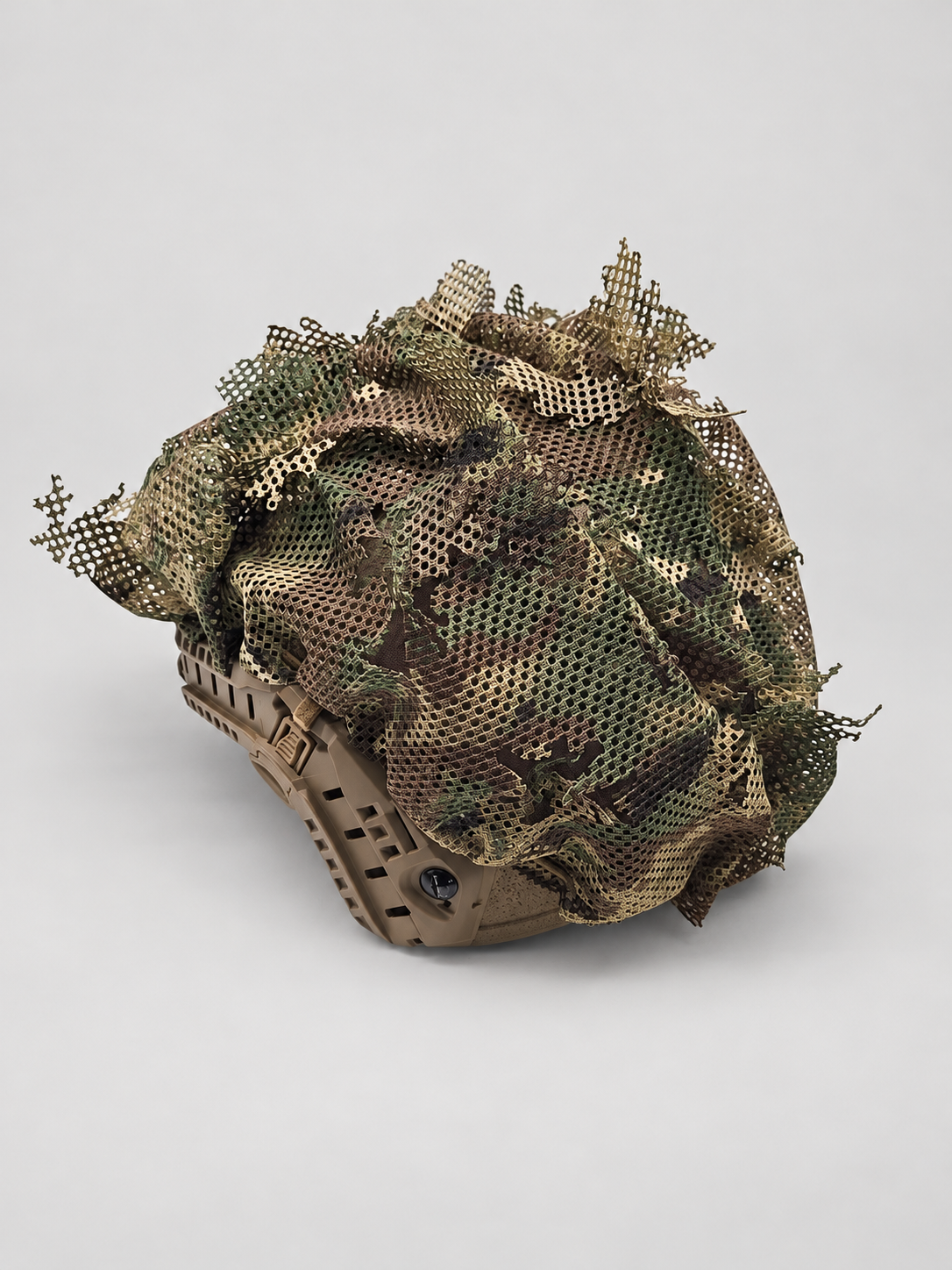 Alternate view 4 of the Tatou Armor MultiCam mesh helmet cover on a tan tactical helmet