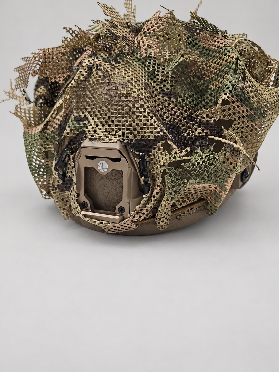 Alternate view 5 of the Tatou Armor MultiCam mesh helmet cover on a tan tactical helmet