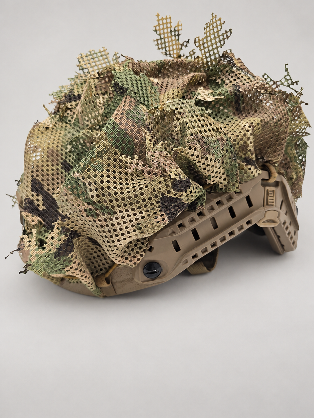 Alternate view 2 of the Tatou Armor MultiCam mesh helmet cover on a tan tactical helmet